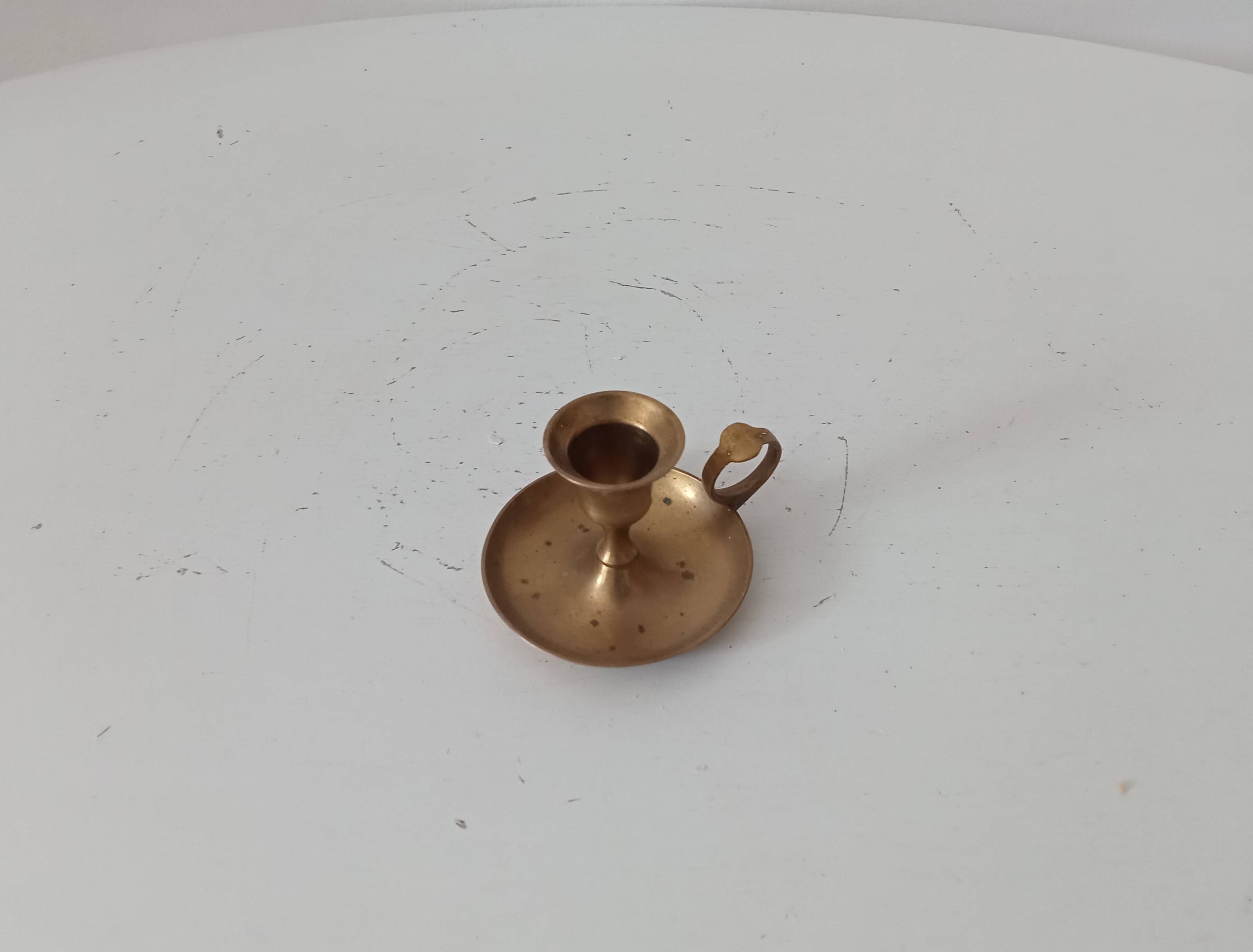 Vintage brass hand candle holder