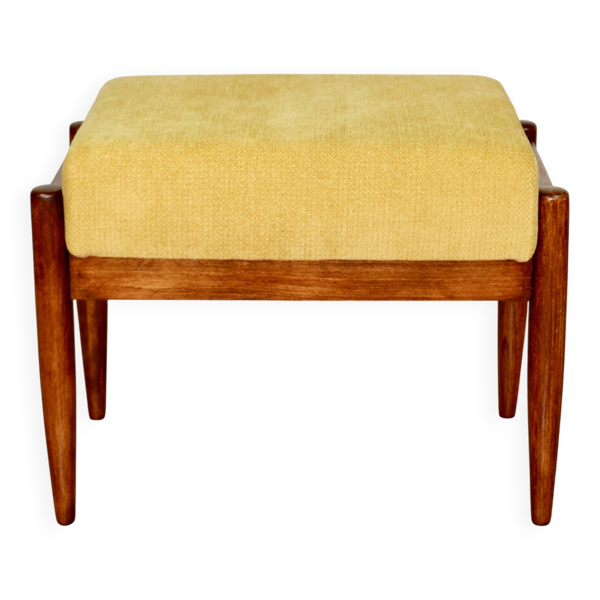 Tabouret Edmund Homa jaune crème avec assise structurale.
