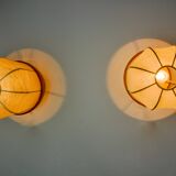 Pair of "cocoon" wall lights, resin and pine, Italy, 1970