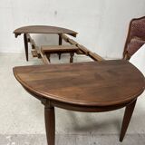 Art Deco table and six chairs in solid walnut, 20th century.