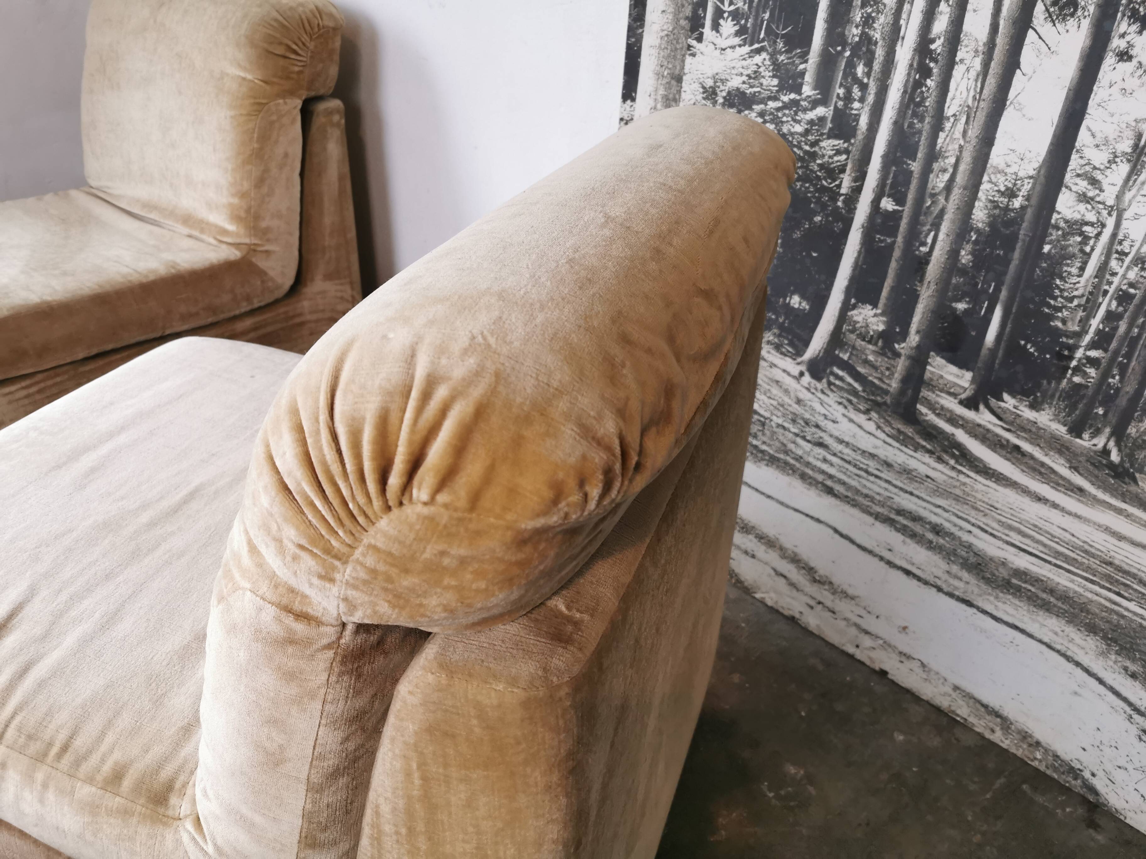 Pair of modular velvet armchairs and ottoman