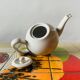 Old insulating teapot in ceramic and chrome metal - Dovo Tiel