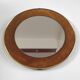 Vintage round mirror in brass and velvet