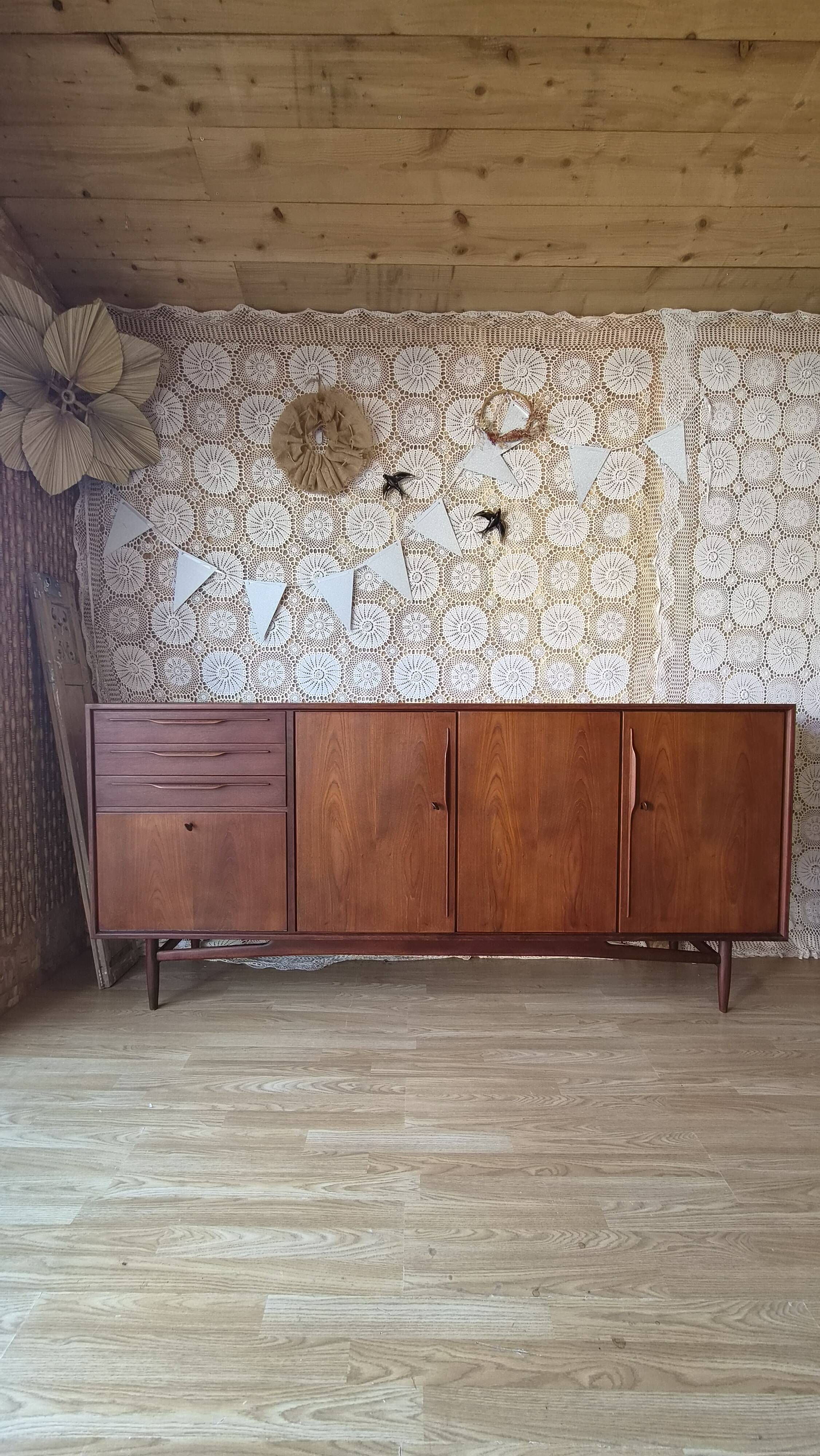 Scandinavian threading Swiss teak model 6002 dated 1961.