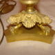 Bronze and brass candlestick, "Restoration" style, electrified as a lamp base.