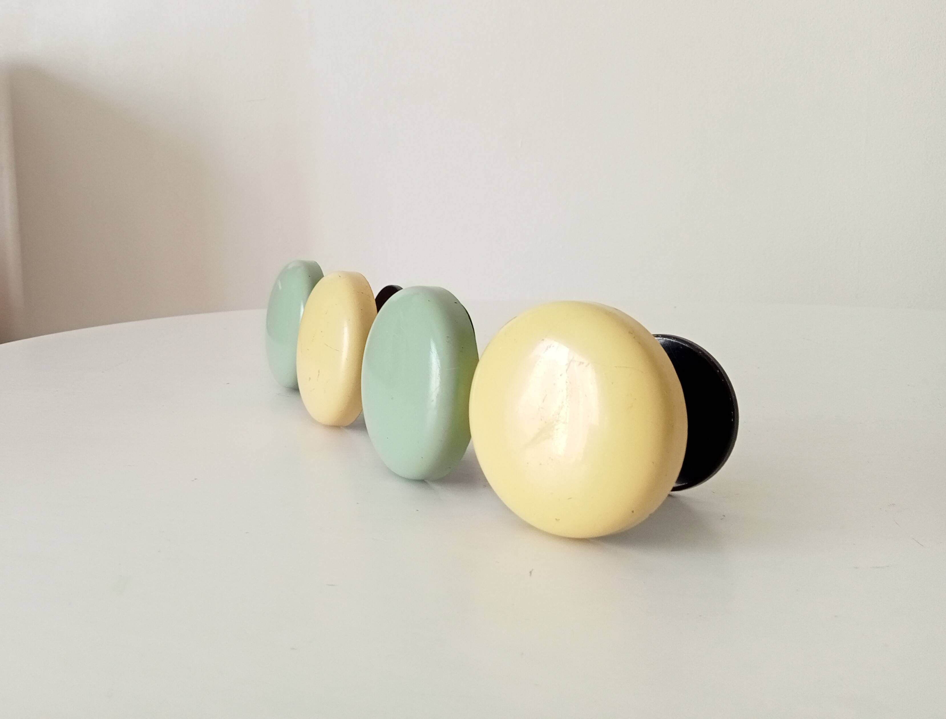Set of 4 vintage coat hooks from the 1960s.