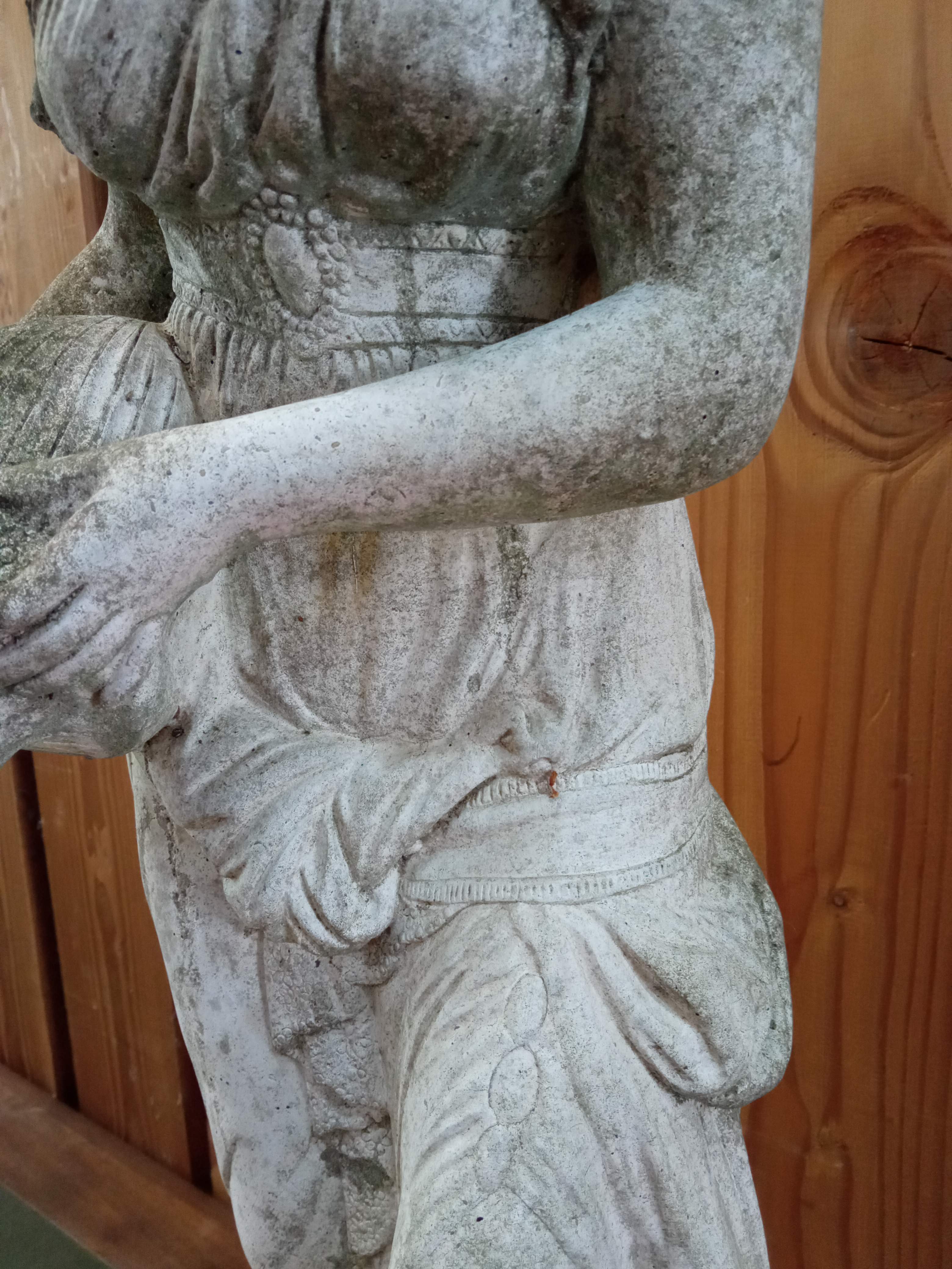 Reconstructed stone garden statue