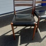 Scandinavian chairs in teak and black skaï.