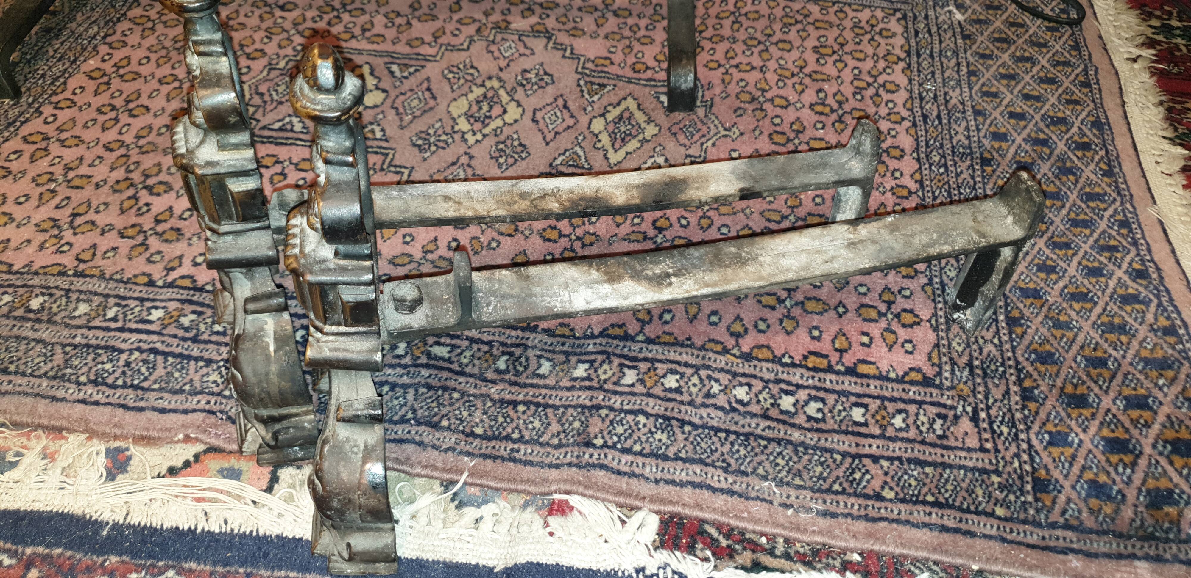 Pair of cast iron and bronze chenets