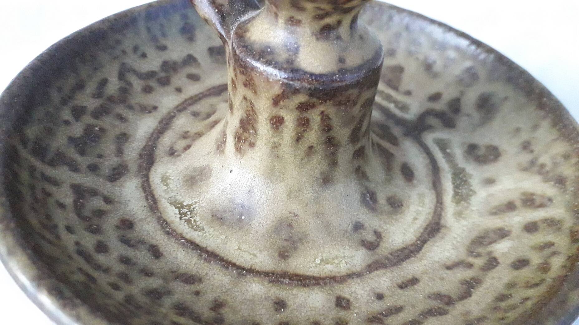 Pair of stoneware candlesticks