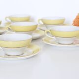Set of 7 cups and under cups in ceramic Moulin des Loups, yellow, French manufacture,
