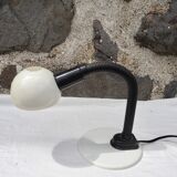 Articulated cream lamp with black plastic arm