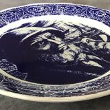 Blue enamelled earthenware wall plate with fisherman decor, Boch La Louvière, Belgium