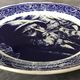 Blue enamelled earthenware wall plate with fisherman decor, Boch La Louvière, Belgium