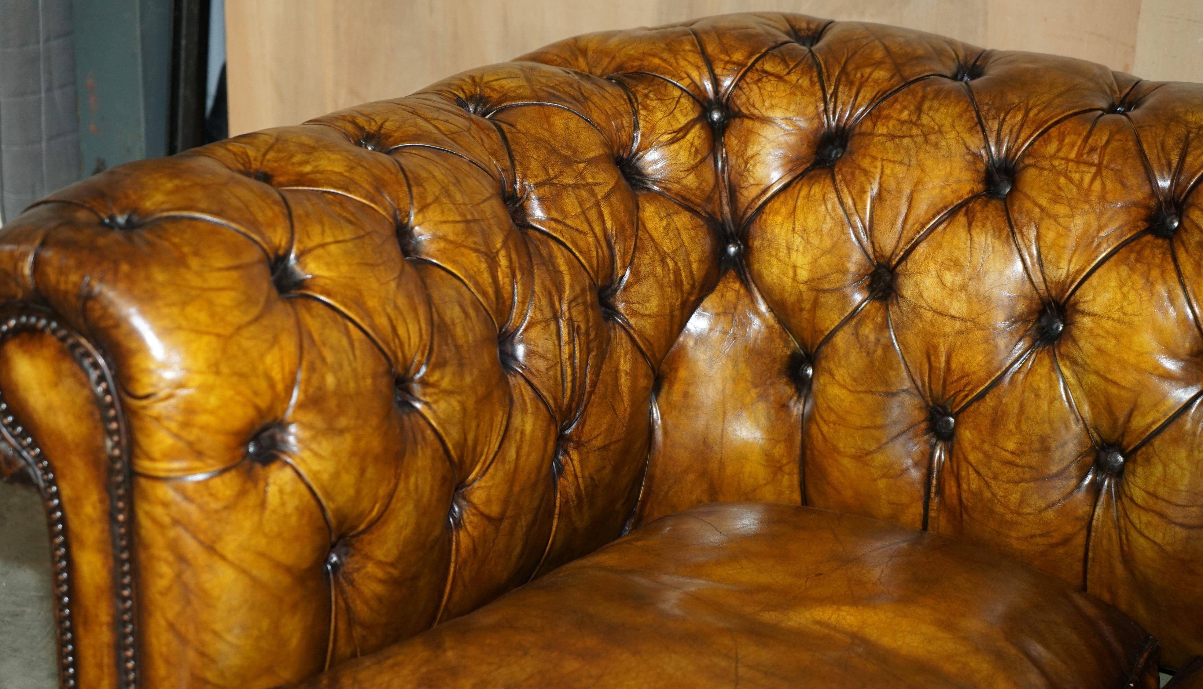 Vintage Chesterfield leather sofa bed, fully restored, circa 1940.