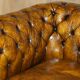 Vintage Chesterfield leather sofa bed, fully restored, circa 1940.