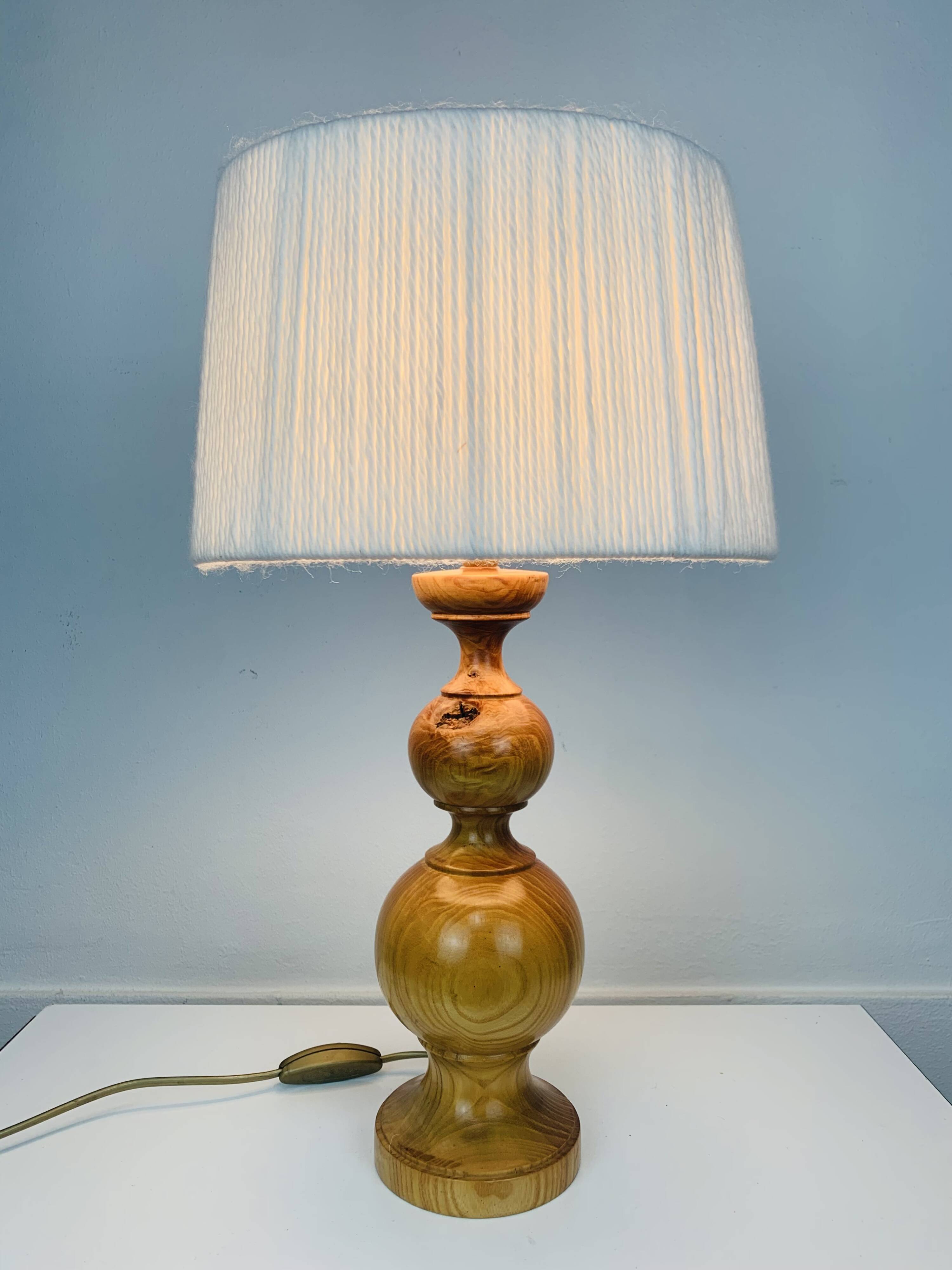 Turned wood lamp and vintage wool lampshade