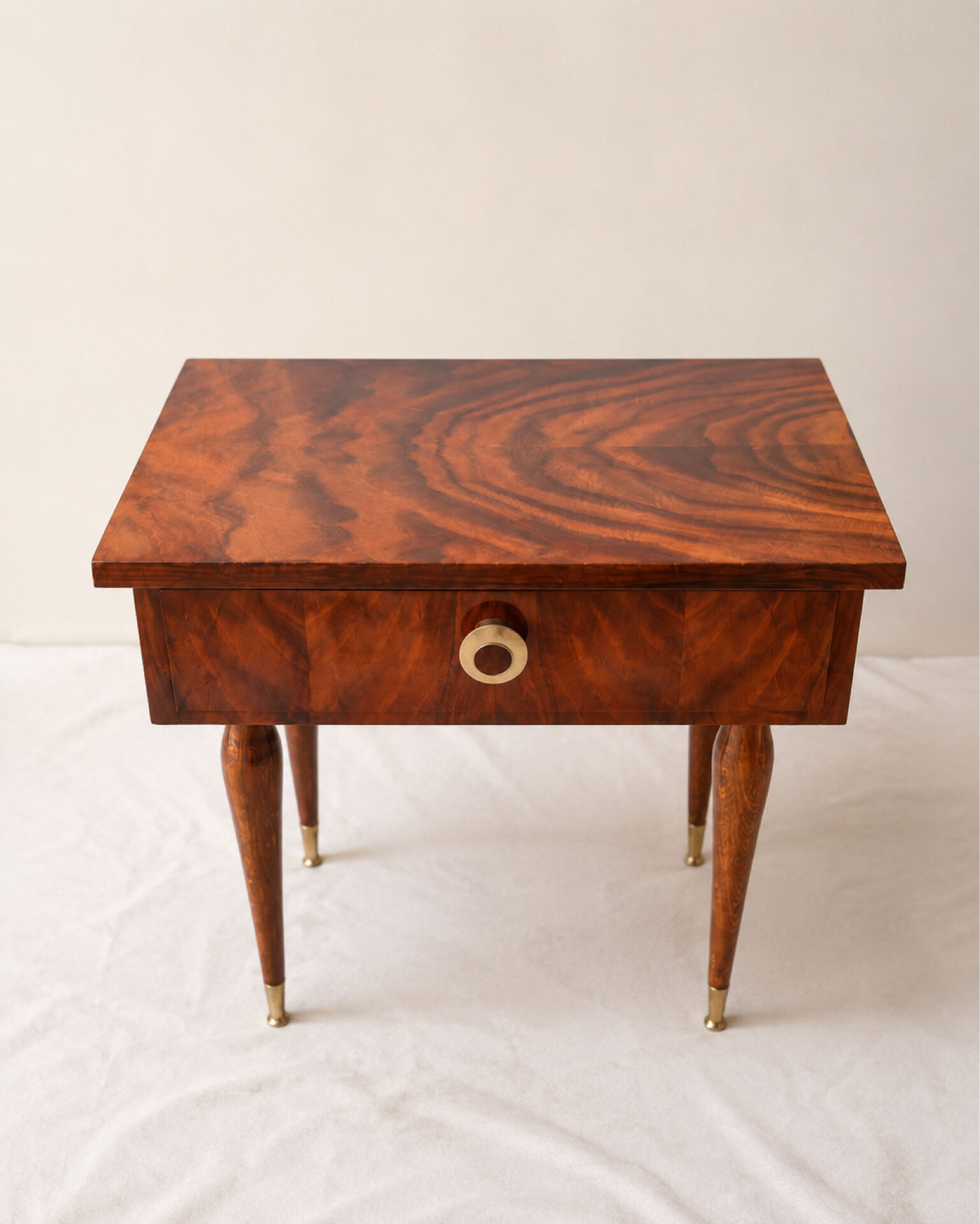 Pair of vintage bedside tables in veneered wood with a glossy finish.