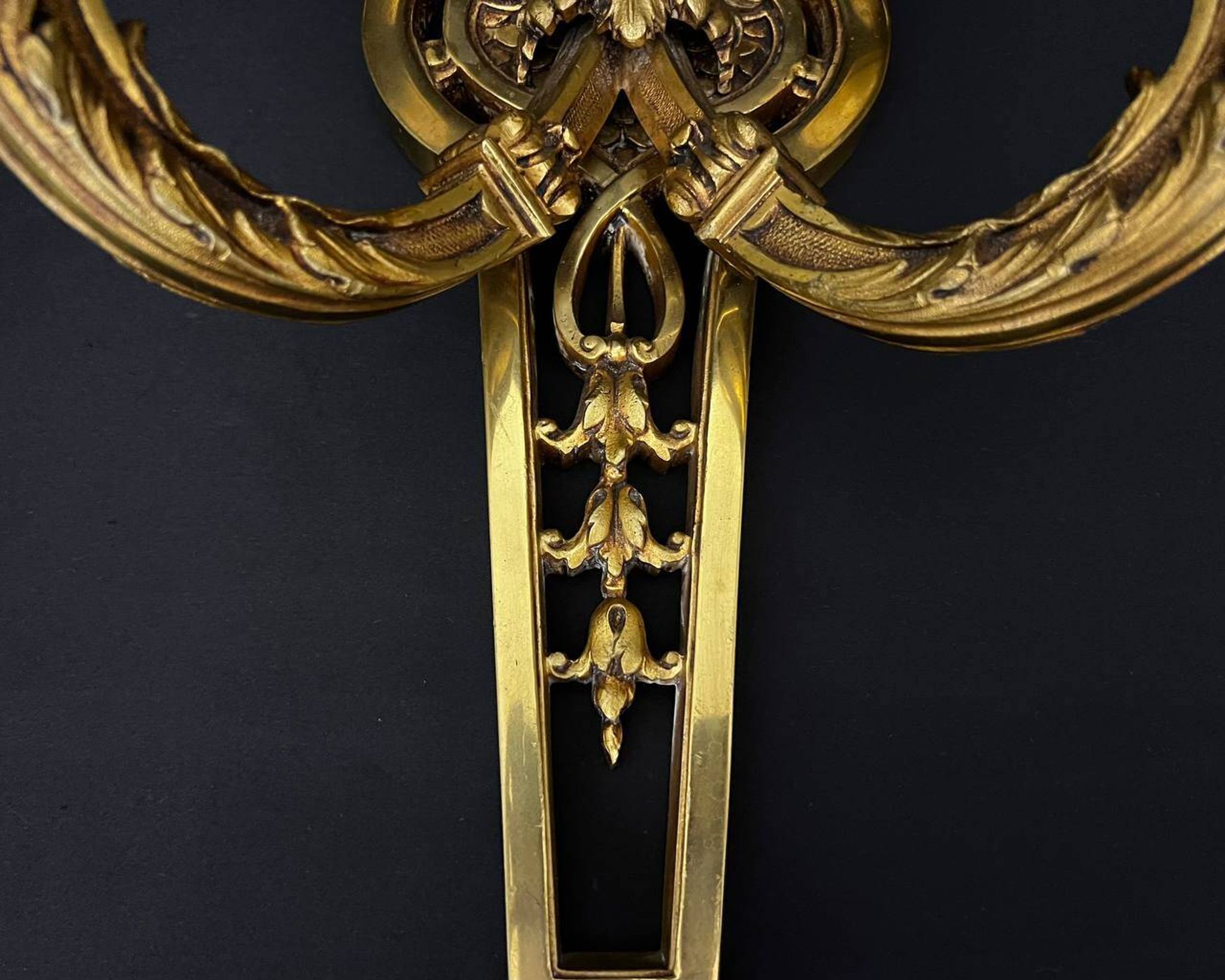 Large pair of gilt bronze wall sconces in the Louis XVI style.