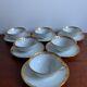 6 cups and golden porcelain saucers