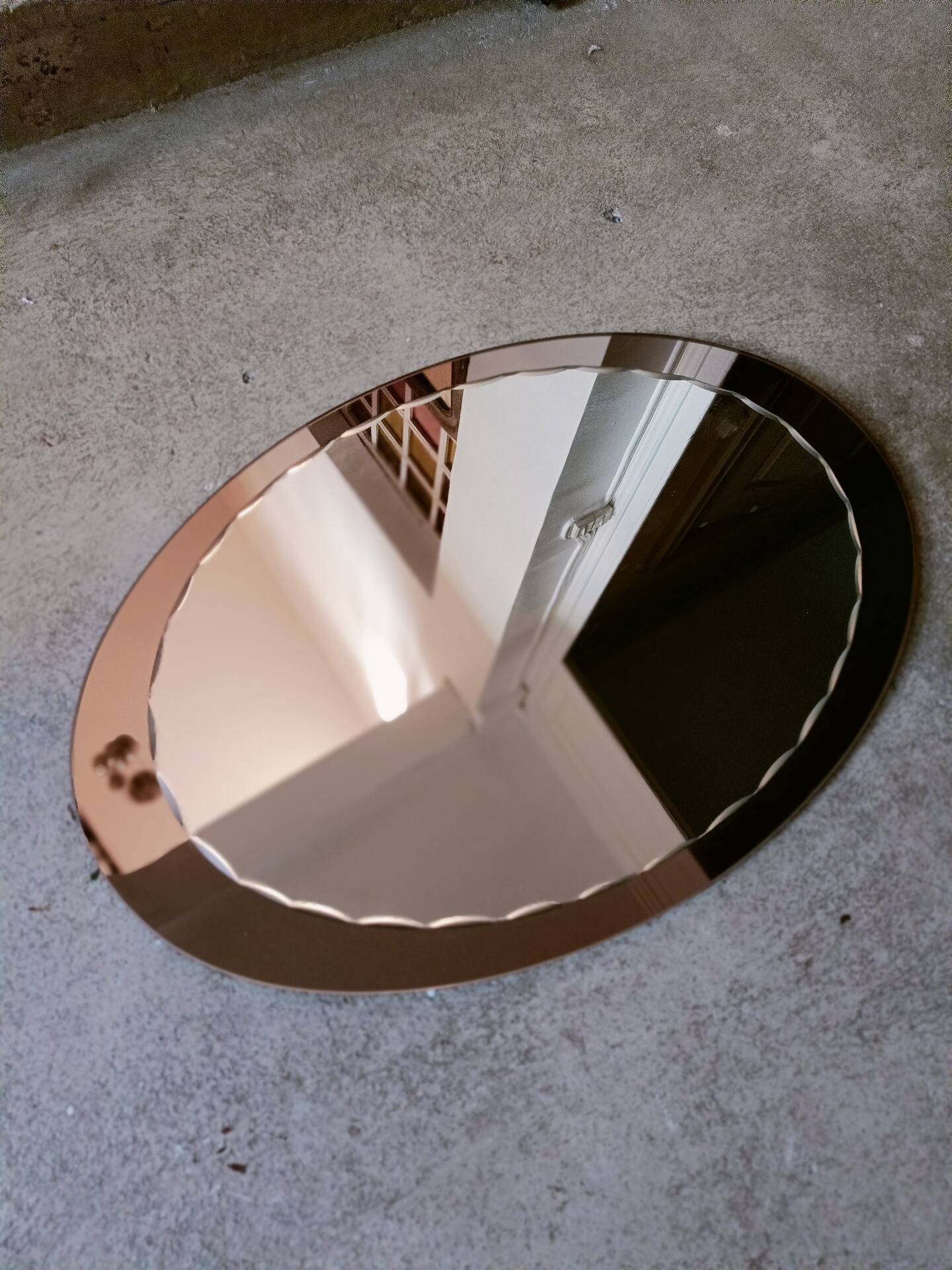 Bevelled oval mirror from the seventies