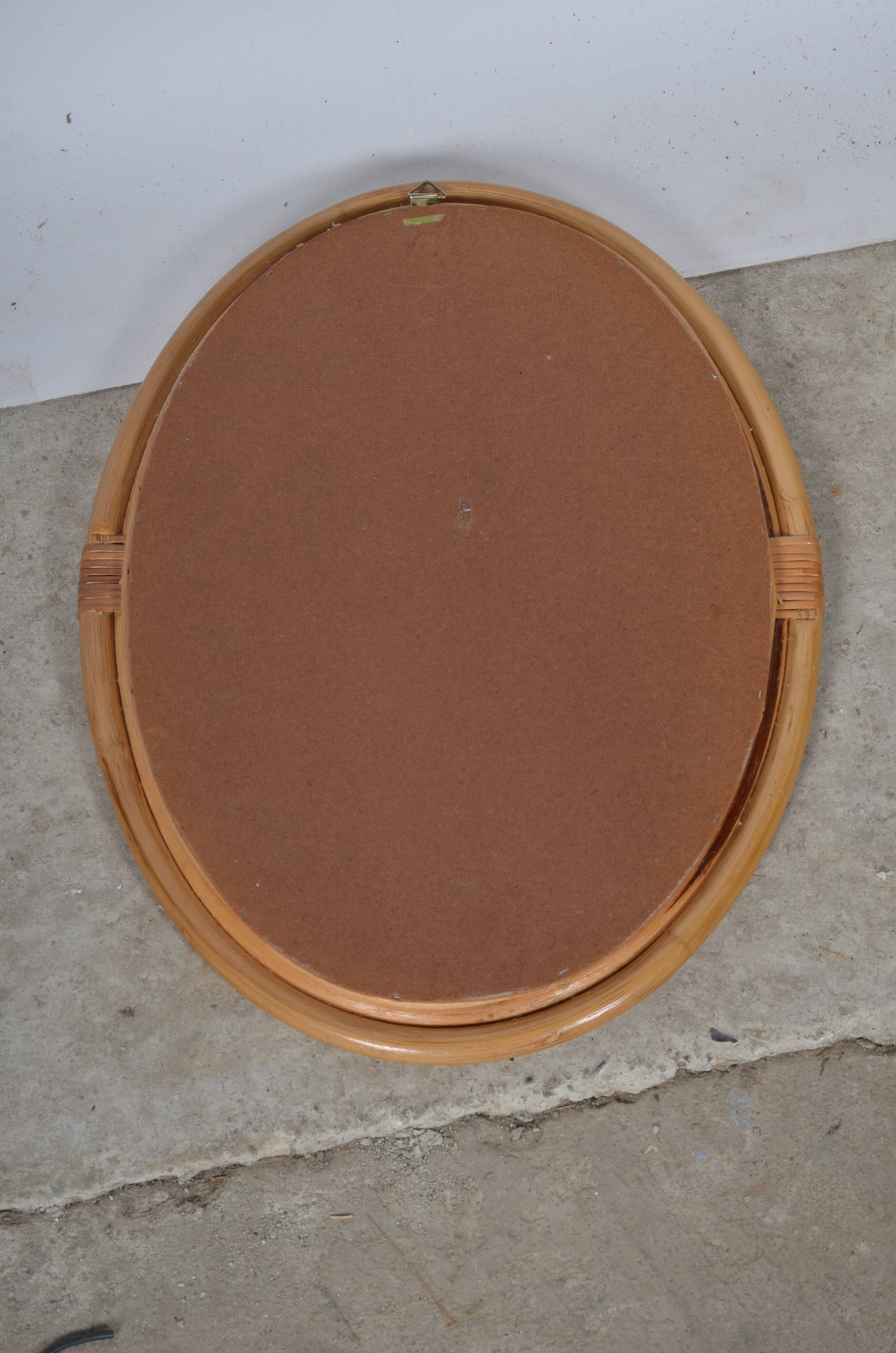 Oval rattan mirror