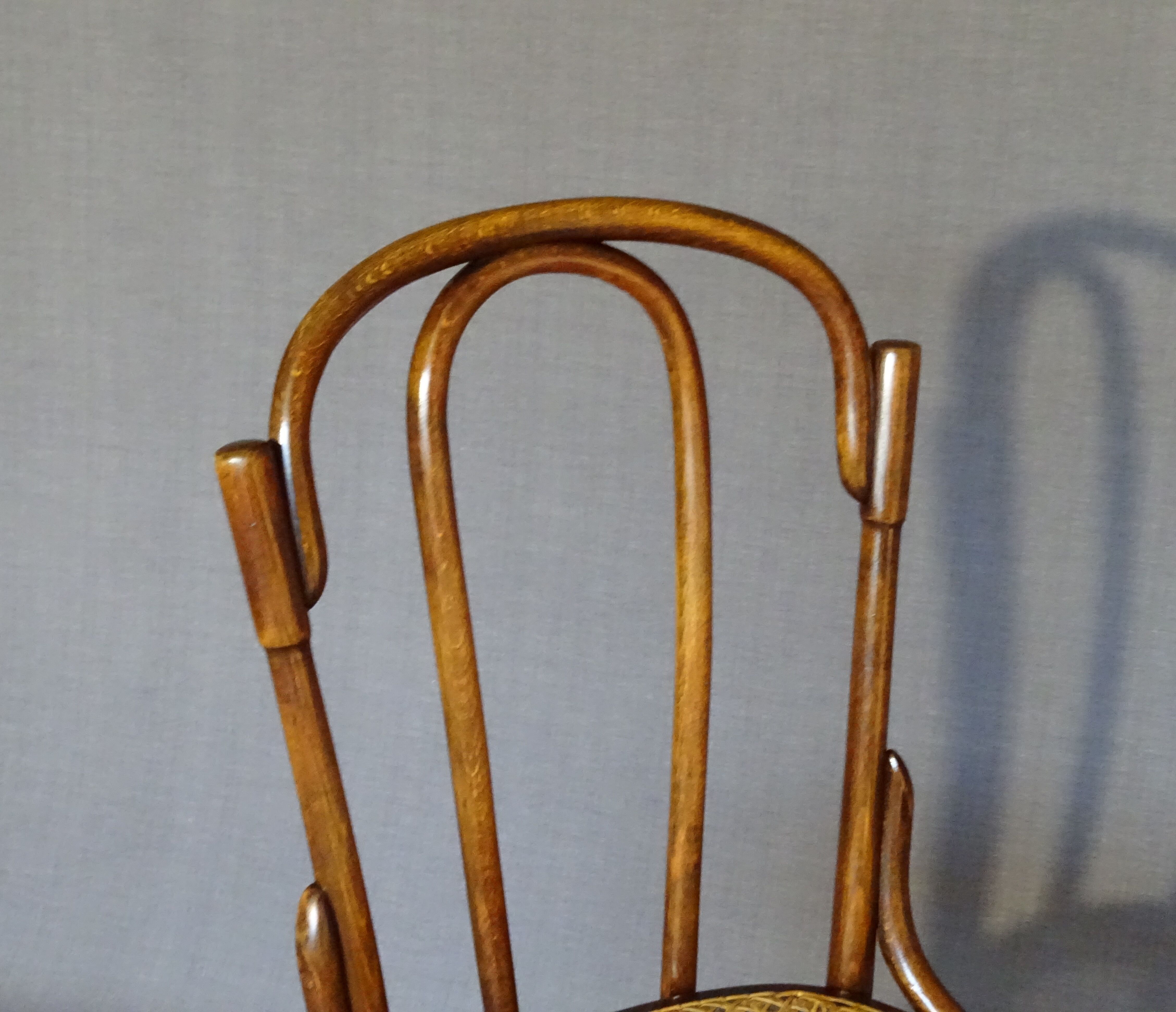 Fake pair of Kohn and Turpe tanned bistro chairs, circa 1900,