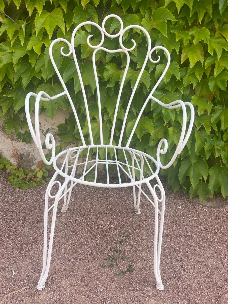 Provençal wrought iron armchairs