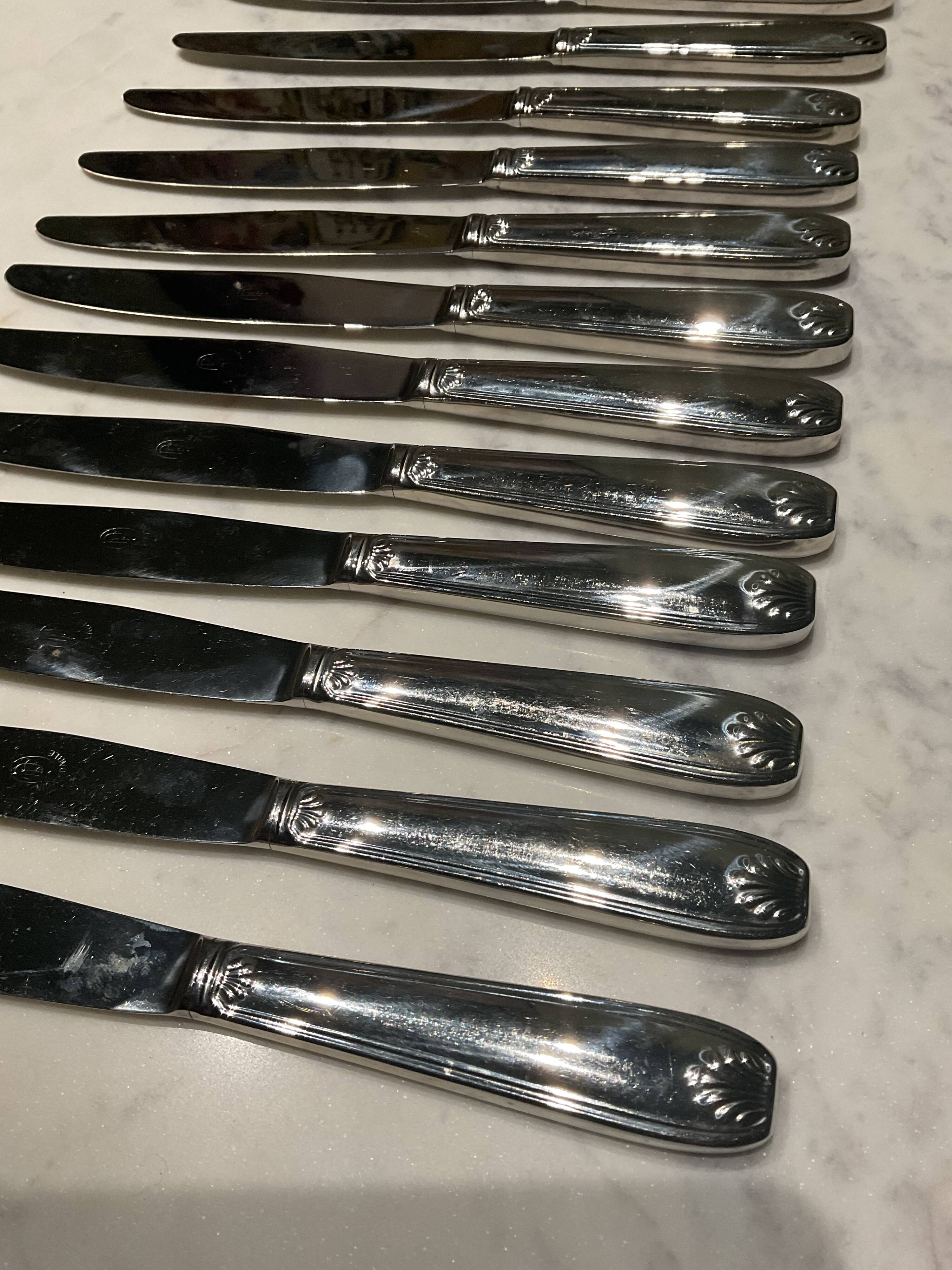 12 couteaux Inox . Vintage