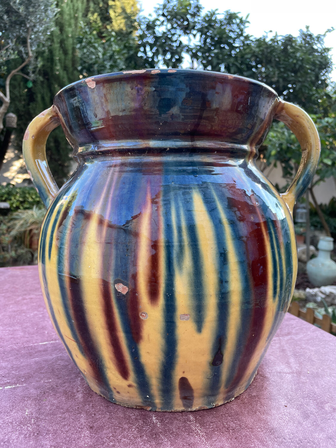 Old flower jar with two glazed earth handles
