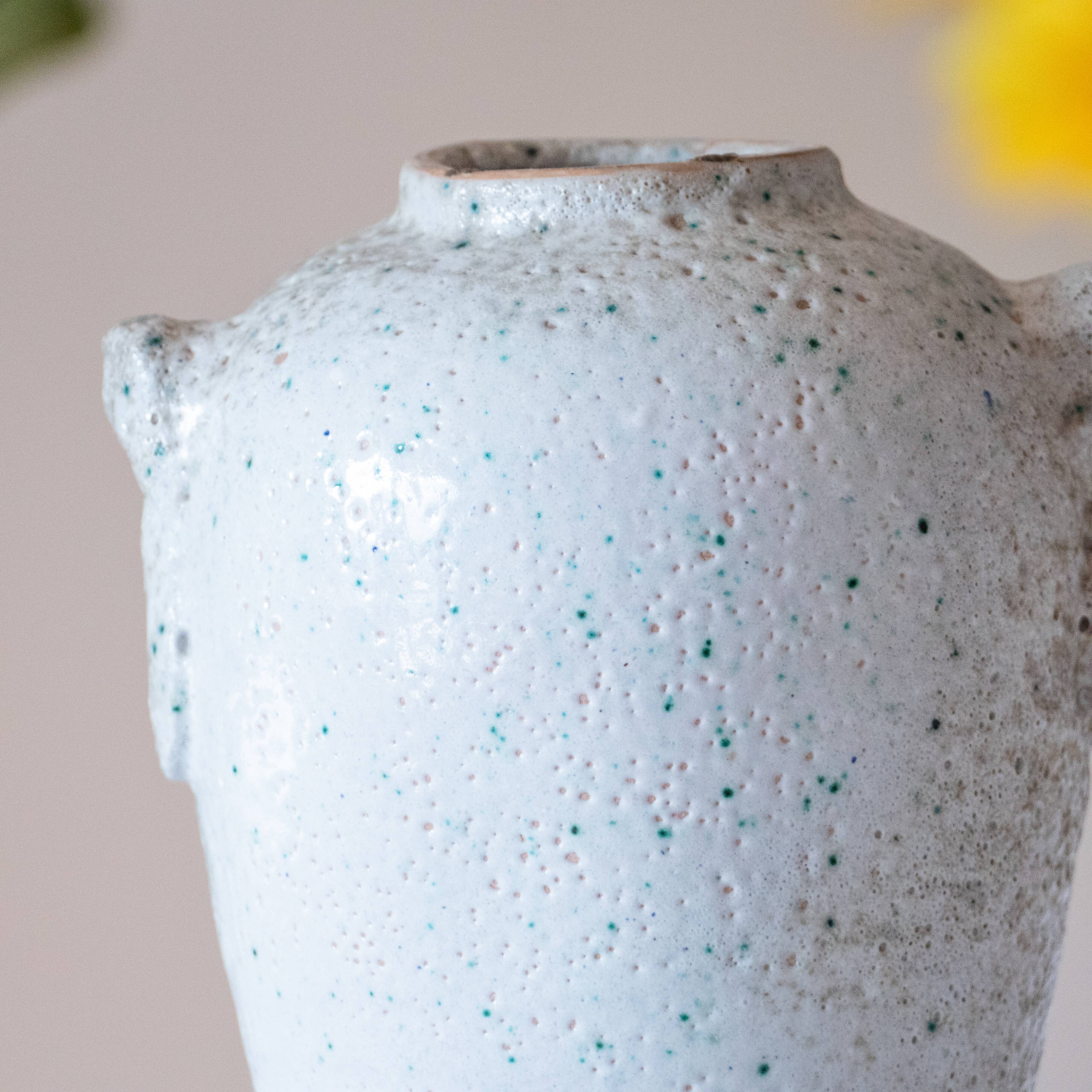 Old foam-glazed terracotta vase
