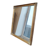 Miroir en bois, doré à la feuille d'or.