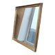 Miroir en bois, doré à la feuille d'or.