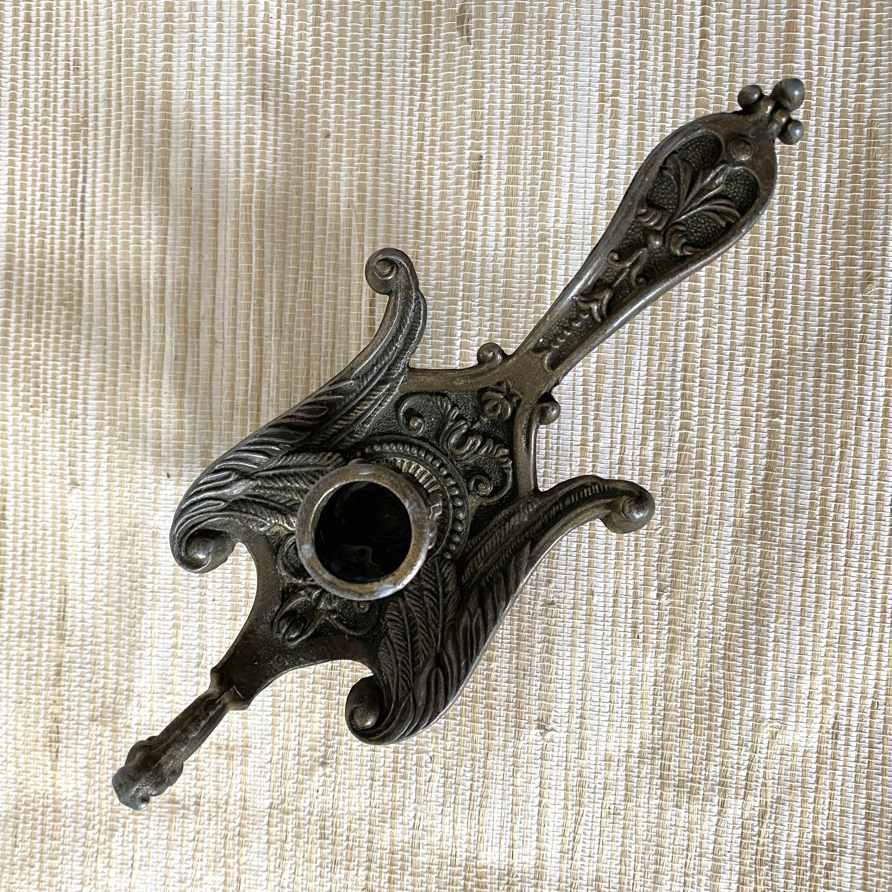 Brass bird candle holder