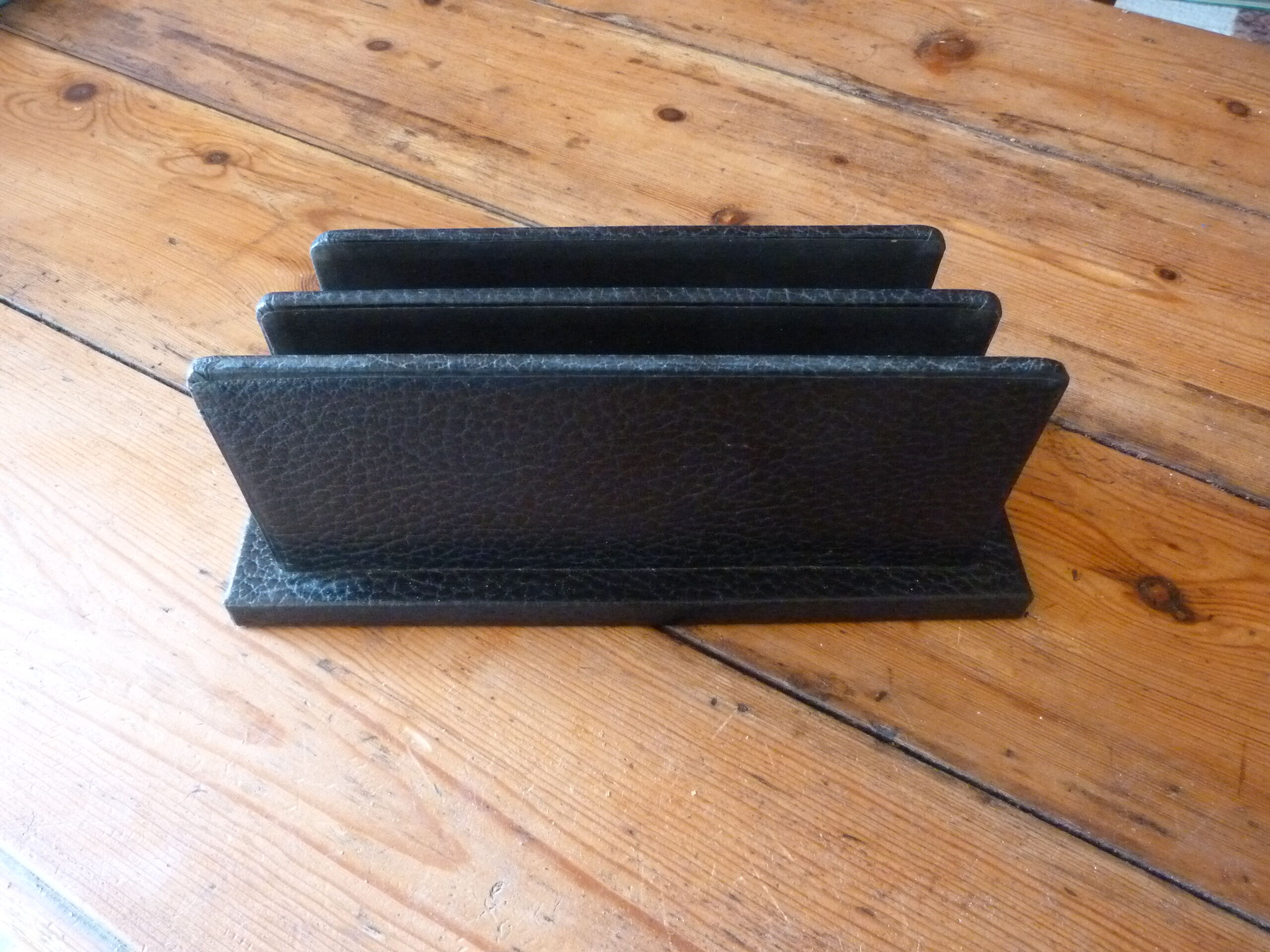 Vintage letter holder in black leather relief office accessory
