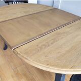 Antique extendable round table with Louis XV style extension