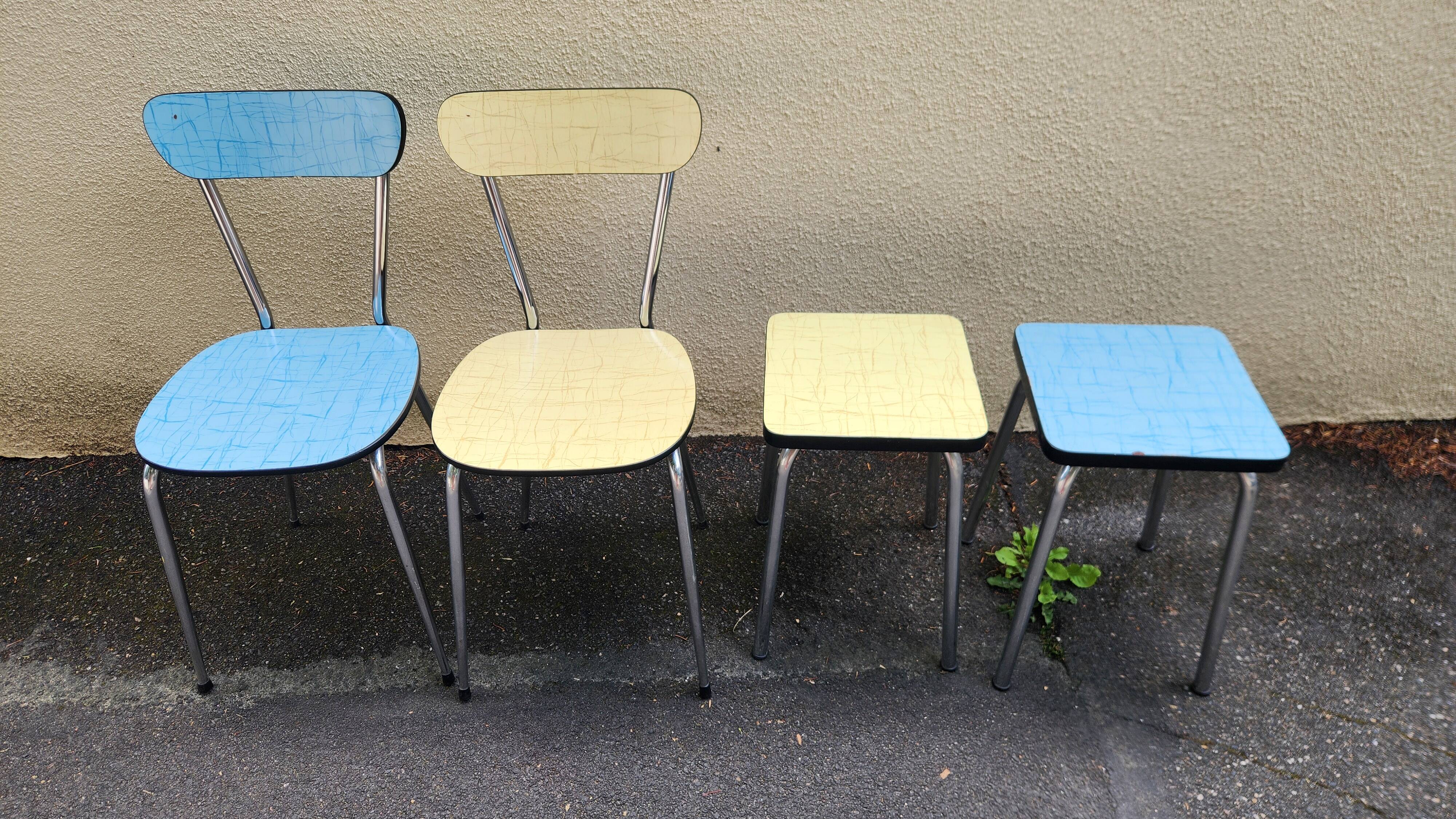 Vintage set from the 60s/70s: table, chairs, and marbled Formica stools.
