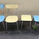 Vintage set from the 60s/70s: table, chairs, and marbled Formica stools.
