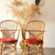 Ensemble de 2 chaises Audoux-Minnet en rotin années 60