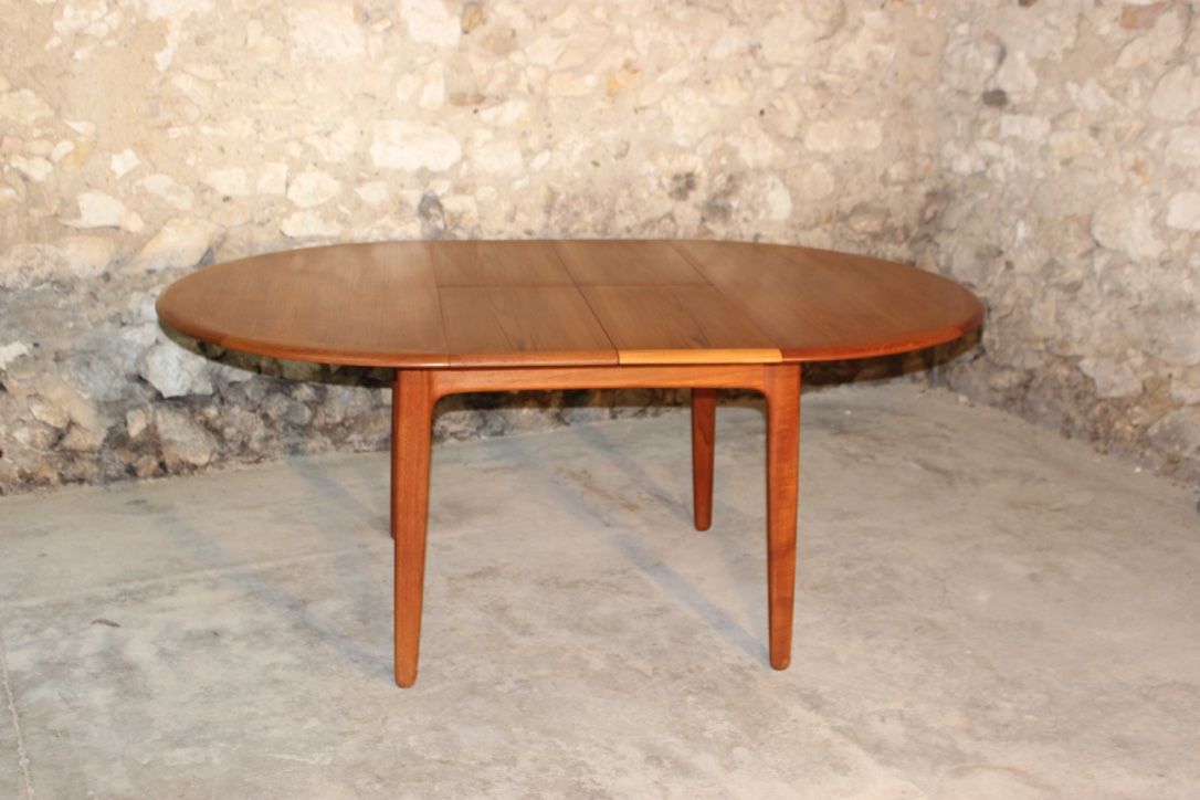 Scandinavian vintage teak dining table with 2 extension cords hidden by Svend Aage Madsen for Knudsen - Son, Denmark