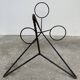 Black metal tripod plant holder