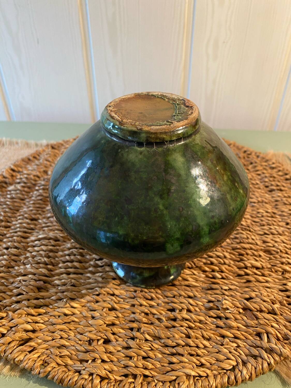 Small green glazed terracotta vase