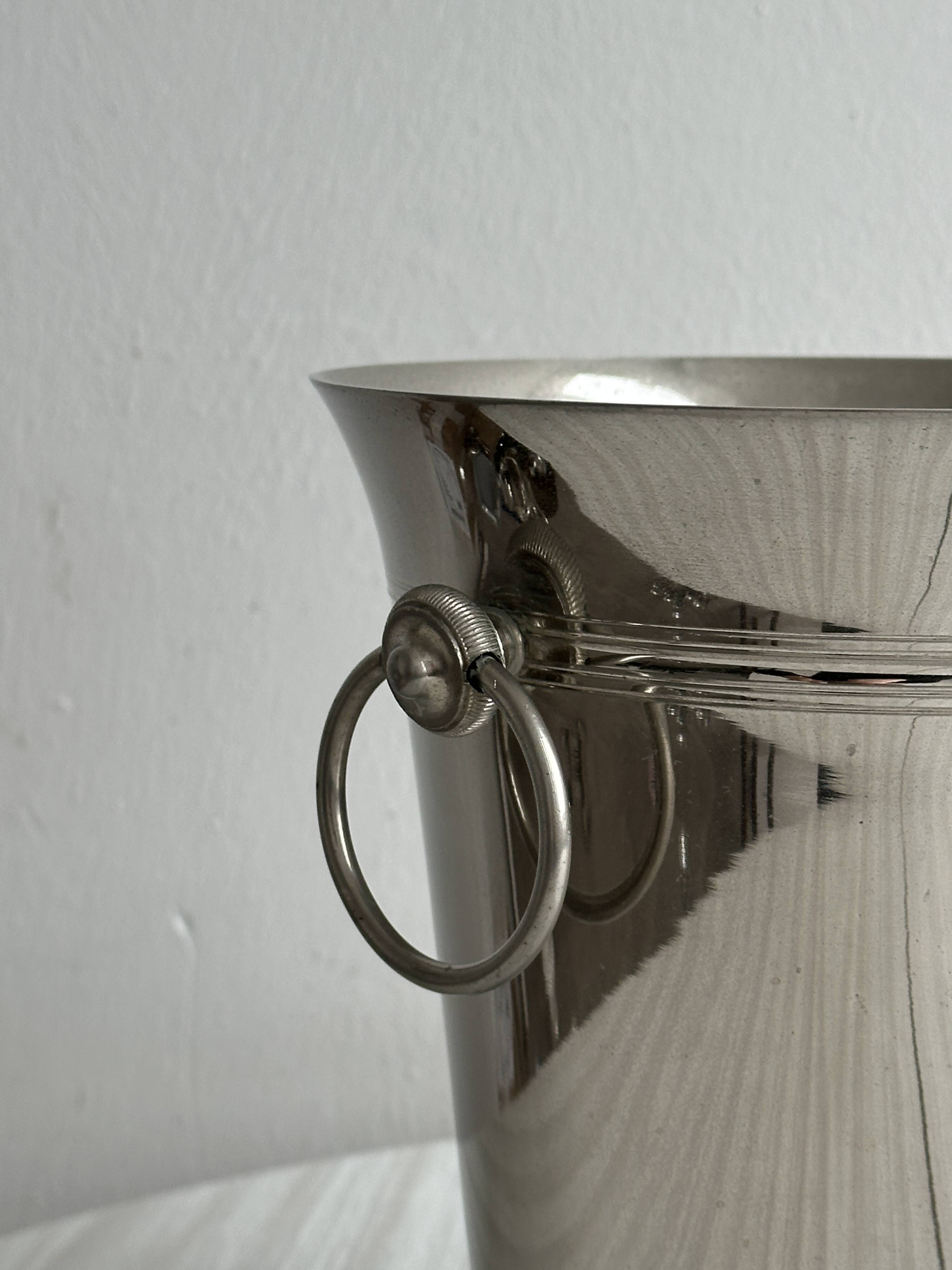 Shiny metal champagne bucket