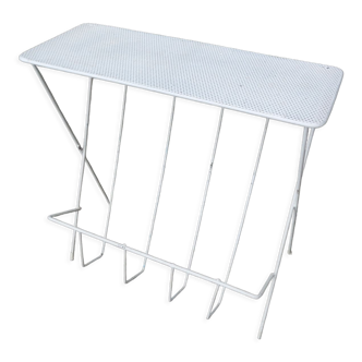 Vintage magazine holder in perforated metal