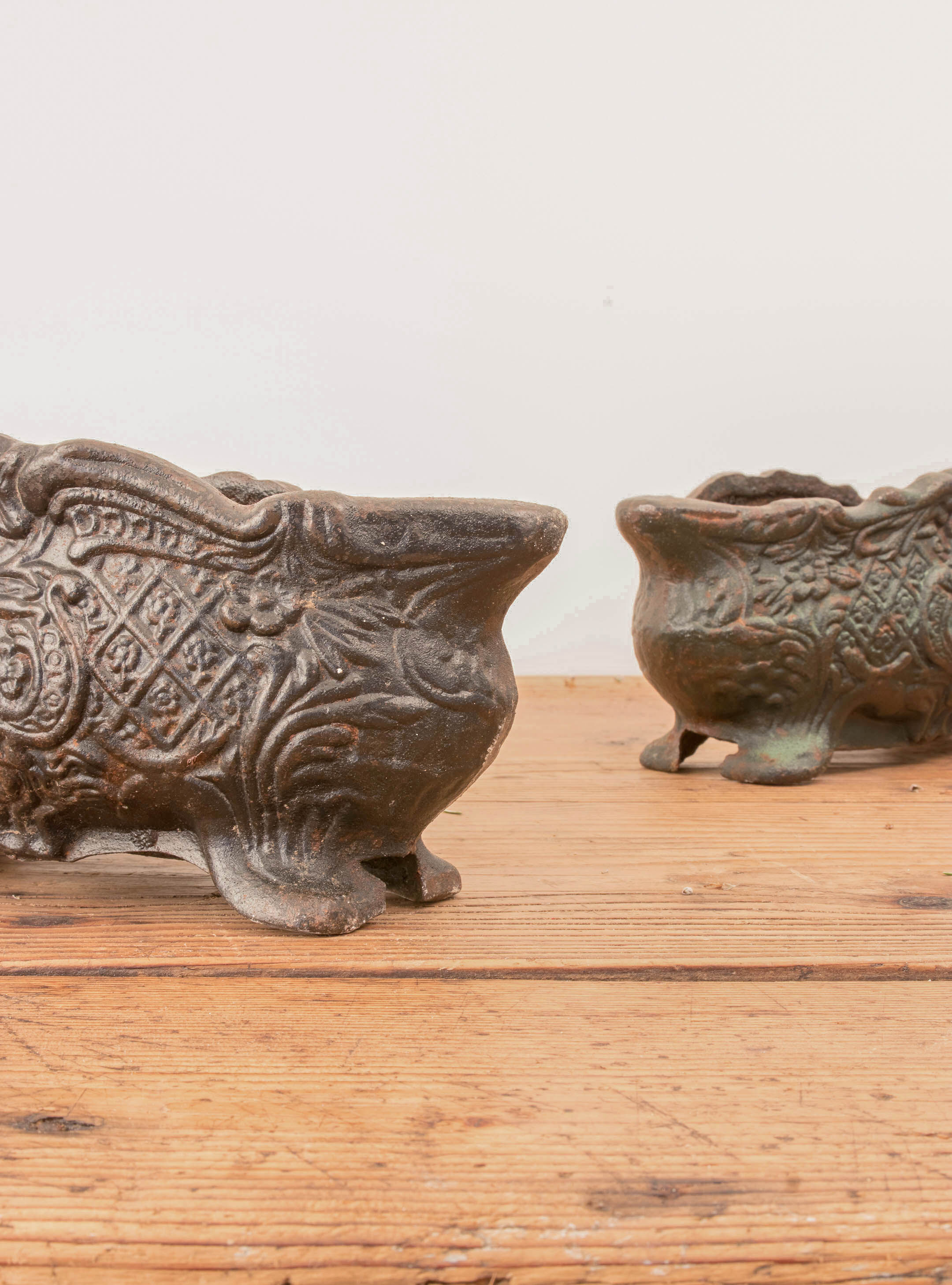 Set of Two Antique Cast Iron Flower Pots