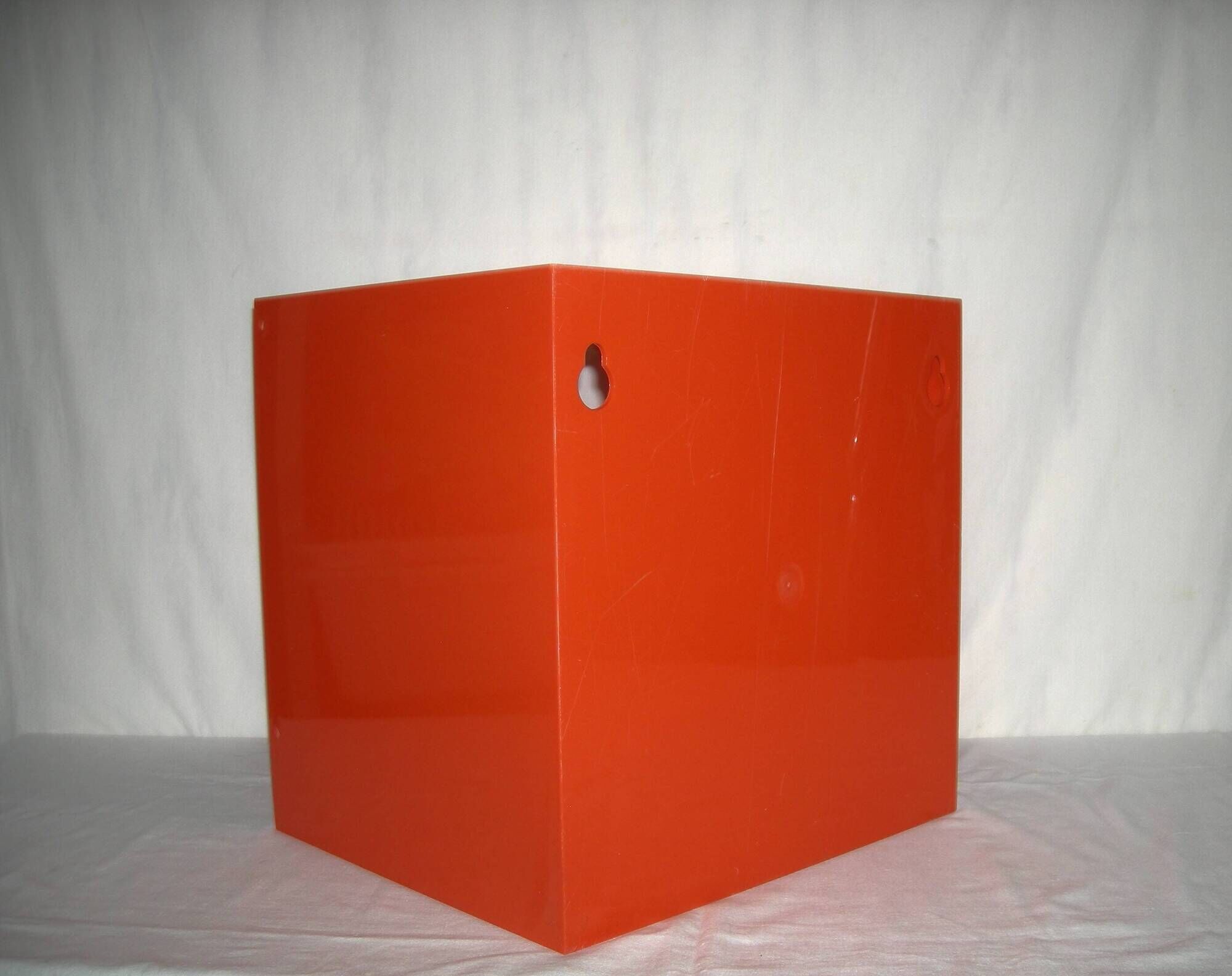 Orange cubic shelf from the 1970s.