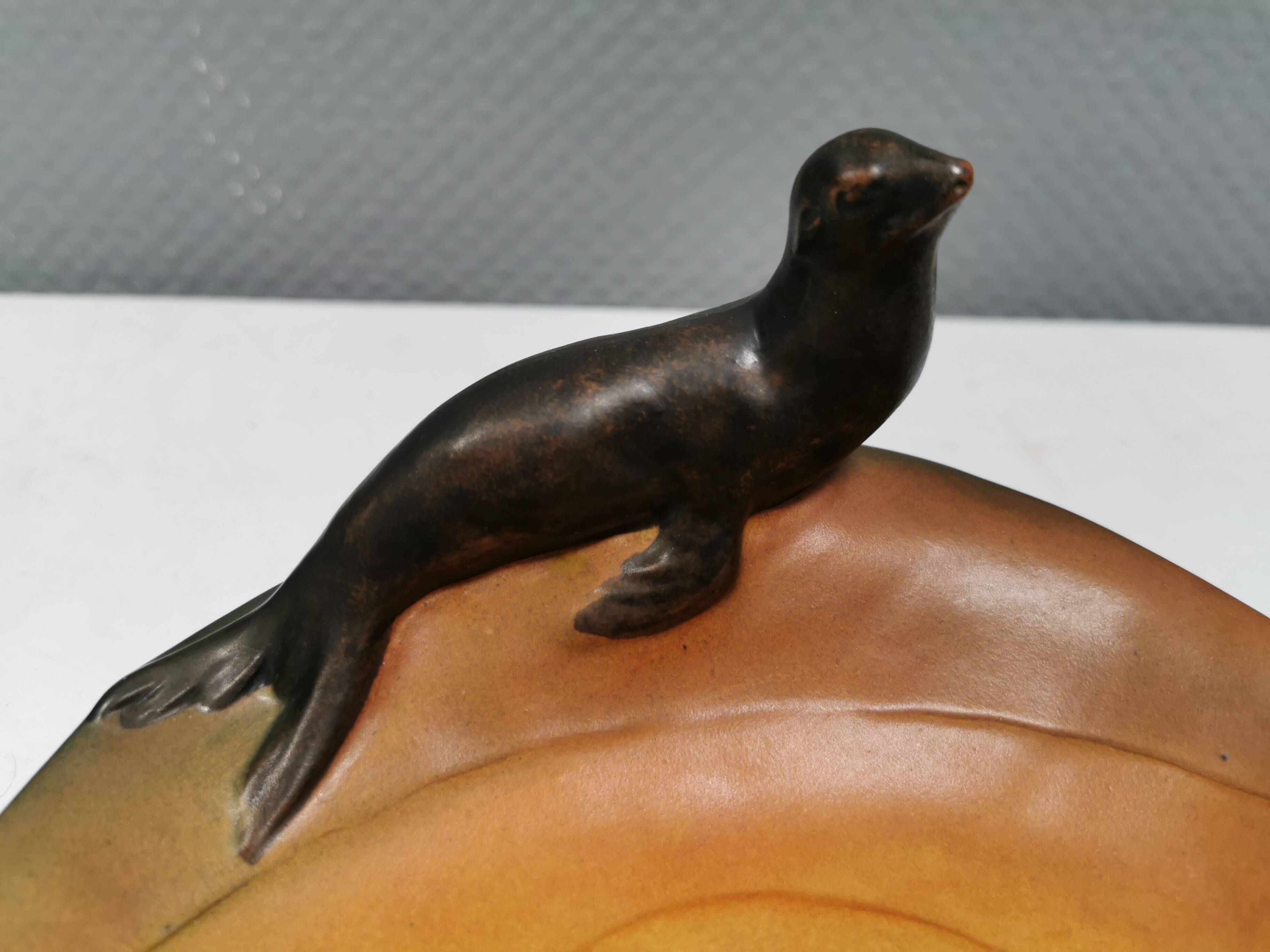 Dish with sea lions hand painted by Ipsen's widow, Denmark 1930s.