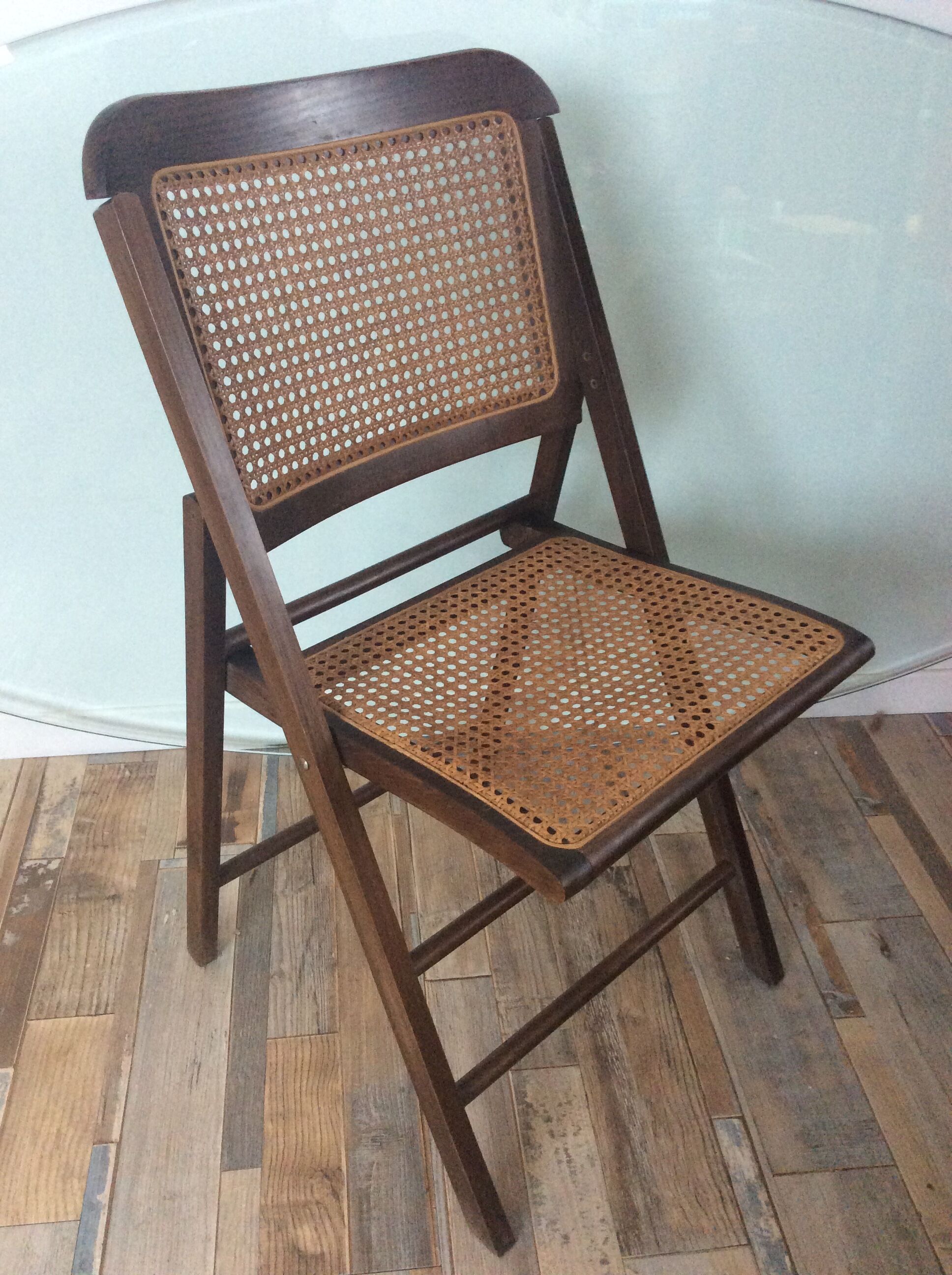 Folding chair caned from the 70s
