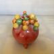 Petit vase boules billes multicolores tripode