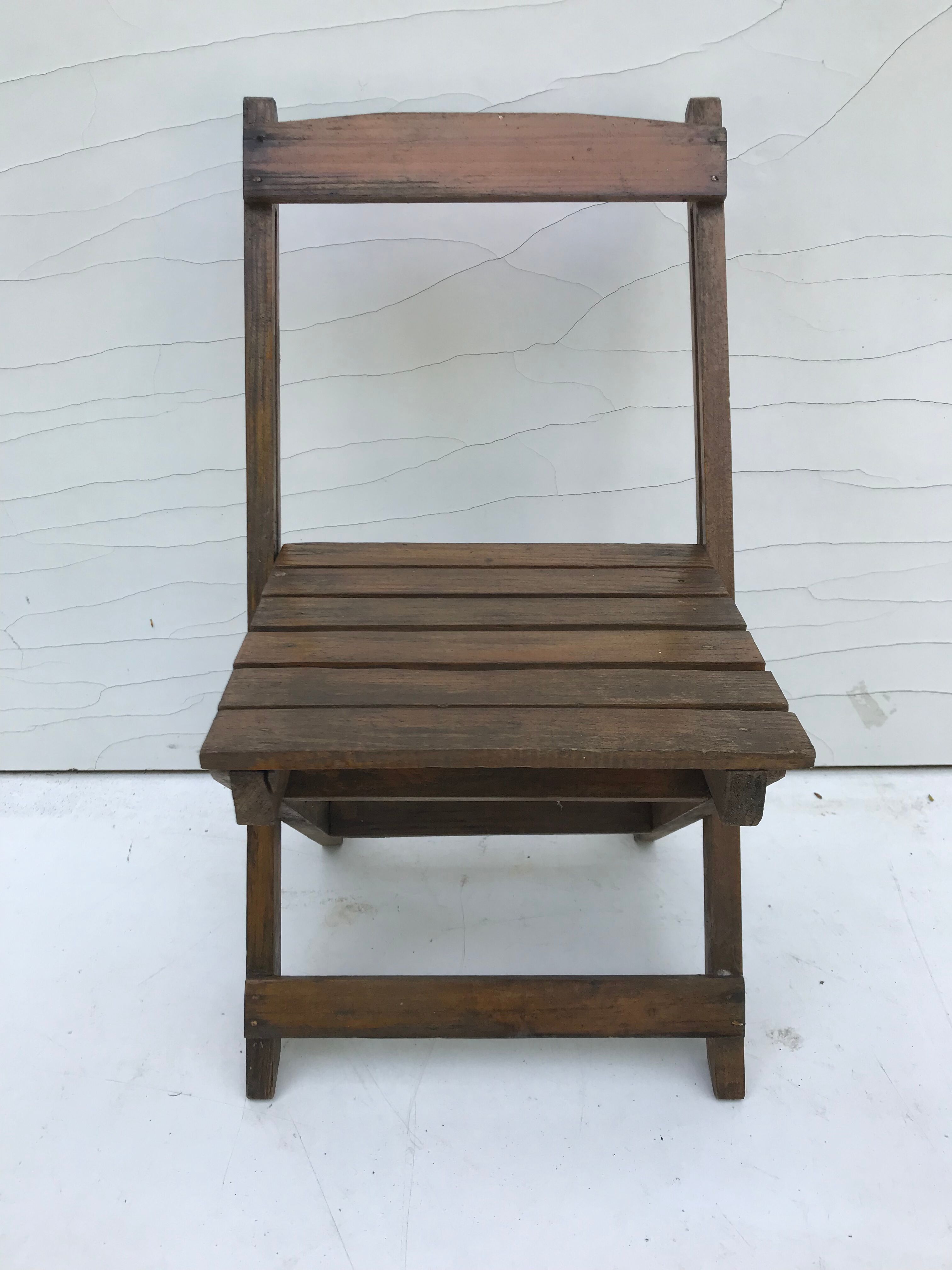 Old folding chair child in wood